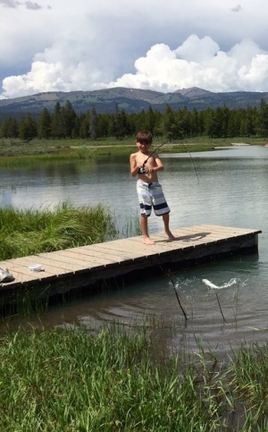 Kid Fishing From the Dock